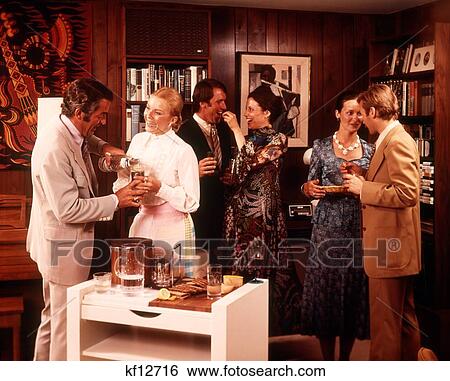 1970S Three Couples Talking Eating Drinking Enjoying A Cocktail Party View Large Photo Image Stock Photograph - 1970S Three Couples Talking Eating Drinking Enjoying A Cocktail Party. Fotosearch