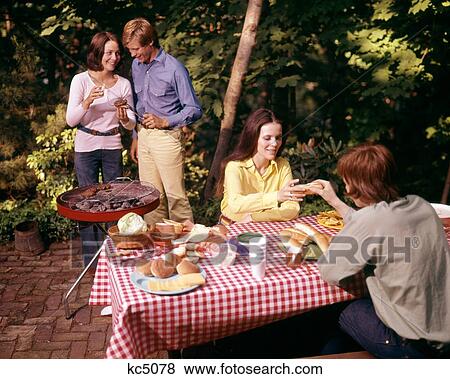 1970S Two Couples Having Backyard Picnic View Large Photo Image Stock Photo - 1970S Two Couples Having Backyard Picnic. Fotosearch