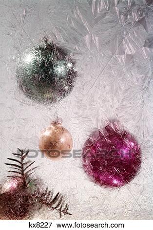 1980s 1970s SILVER GOLD MAGENTA CHRISTMAS BALL ORNAMENTS SEEN THROUGH FROSTED GLASS View Large Photo Image Stock Photo - 1980s 1970s SILVER GOLD MAGENTA CHRISTMAS BALL ORNAMENTS SEEN THROUGH FROSTED GLASS. Fotosearch