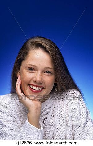 1980s PORTRAIT HAPPY SMILING TEENAGE GIRL LOOKING AT CAMERA View Large Photo Image Stock Photograph - 1980s PORTRAIT HAPPY SMILING TEENAGE GIRL LOOKING AT CAMERA. Fotosearch