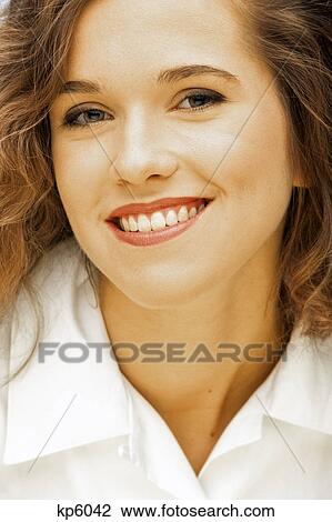 1990s CLOSE-UP OF WOMAN'S FACE LOOKING AT CAMERA View Large Photo Image Stock Image - 1990s CLOSE-UP OF WOMAN'S FACE LOOKING AT CAMERA. Fotosearch