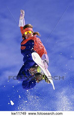 1990S Young Woman On Snowboard Vail Colorado View Large Photo Image Stock Photo - 1990S Young Woman On Snowboard Vail Colorado. Fotosearch
