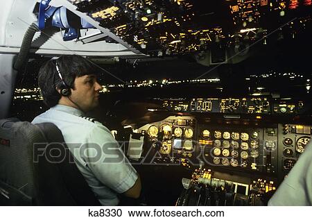 747 Commercial Airplane Crew Captain Sitting In Cockpit Pilot Seat View Large Photo Image Stock Image - 747 Commercial Airplane Crew Captain Sitting In Cockpit Pilot Seat. Fotosearch