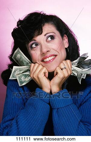Excited Brunette Woman Holding Several 100 Dollar Bills View Large Photo Image Stock Image - Excited Brunette Woman Holding Several 100 Dollar Bills . Fotosearch