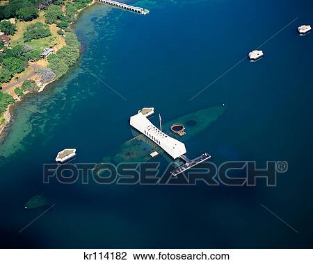 Stock Image - OAHU HAWAII AERIAL OF THE USS ARIZONA MEMORIAL. Fotosearch