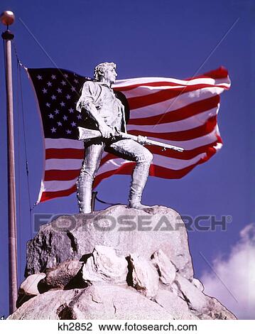 THE LEXINGTON MINUTEMAN STATUE SUPERIMPOSED ON AMERICAN FLAG AGAINST BLUE SKY LEXINGTON BATTLE GREEN MASSACHUSETTS USA View Large Photo Image Stock Image - THE LEXINGTON MINUTEMAN STATUE SUPERIMPOSED ON AMERICAN FLAG AGAINST BLUE SKY LEXINGTON BATTLE GREEN MASSACHUSETTS USA. Fotosearch