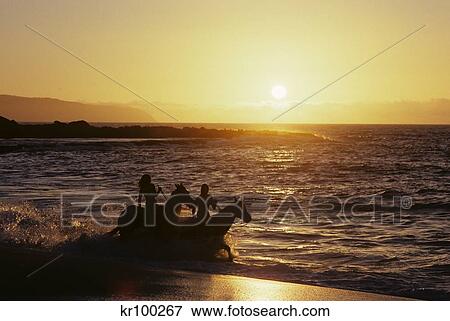 Two Anonymous Riders On Horseback Riding In Surf At Sunset Banzai Beach Hawaii View Large Photo Image Stock Photo - Two Anonymous Riders On Horseback Riding In Surf At Sunset Banzai Beach Hawaii . Fotosearch