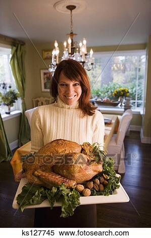 Stock Image of Woman with roast turkey ks127745 - Search Stock Photos ...