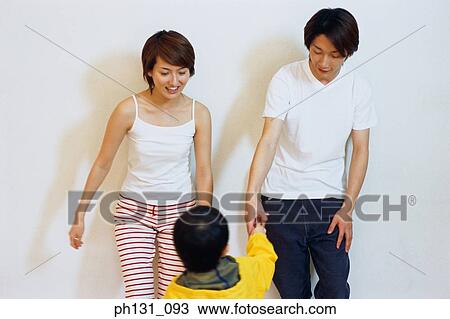 Asian couple with their child View Large Photo Image Stock Image - Asian couple with their child. Fotosearch