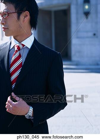 Asian Man looking sideways View Large Photo Image Stock Photography - Asian Man looking sideways. Fotosearch