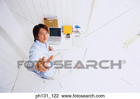 Asian man pointing up View Large Photo Image Stock Image - Asian man pointing up. Fotosearch