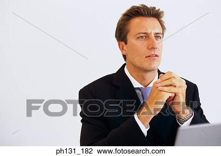 Caucasian man at a meeting View Large Photo Image Stock Image - Caucasian man at a meeting. Fotosearch