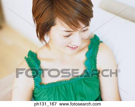Close up of a Asian woman's face View Large Photo Image Stock Photo - Close up of a Asian woman's face. Fotosearch
