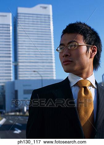 Stock Photo - Side profile of a Asian Man. Fotosearch