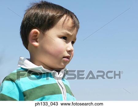 Young boy looking ahead View Large Photo Image Stock Image - Young boy looking ahead. Fotosearch
