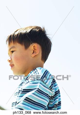 Young boy looking ahead View Large Photo Image Stock Photo - Young boy looking ahead. Fotosearch