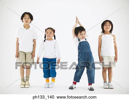 Stock Image - Young children posing. Fotosearch
