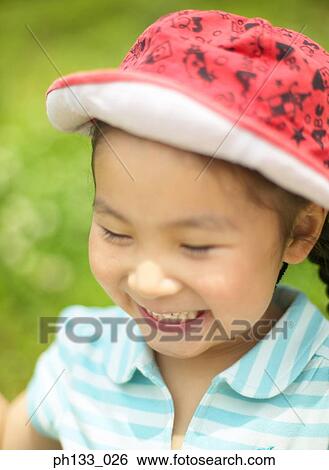 Young girl smiling View Large Photo Image Stock Photograph - Young girl smiling. Fotosearch