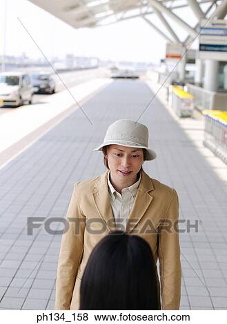 Young man at airport View Large Photo Image Stock Photo - Young man at airport. Fotosearch