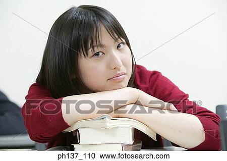 Teenage girl in class View Large Photo Image Stock Image - Teenage girl in class. Fotosearch
