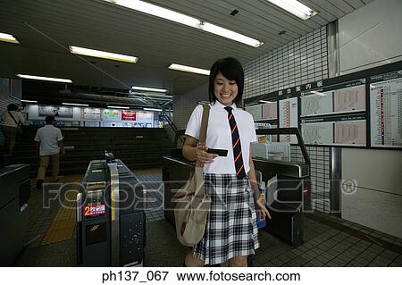 Stock Photo - Teenage girl smiling. Fotosearch