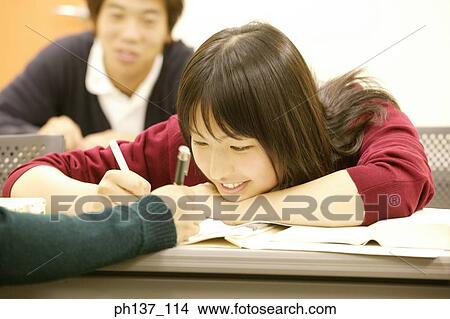 Teenagers in class View Large Photo Image Picture - Teenagers in class. Fotosearch