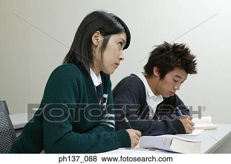 Stock Photo - Teenagers in class. Fotosearch