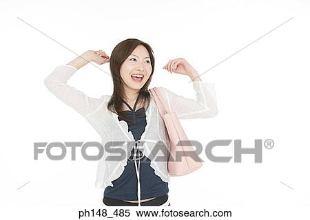 Stock Photography - Close-up of a young woman laughing. Fotosearch