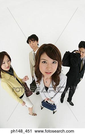 High angle view of two businessmen and two businesswomen View Large Photo Image Stock Image - High angle view of two businessmen and two businesswomen. Fotosearch