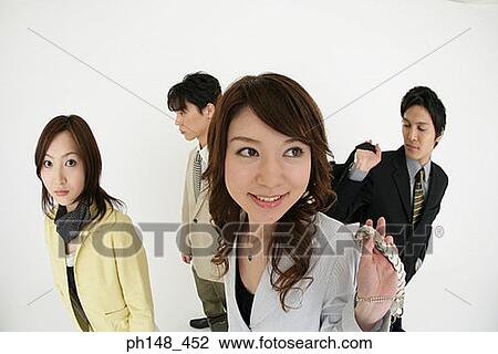 High angle view of two businessmen and two businesswomen View Large Photo Image Stock Image - High angle view of two businessmen and two businesswomen. Fotosearch
