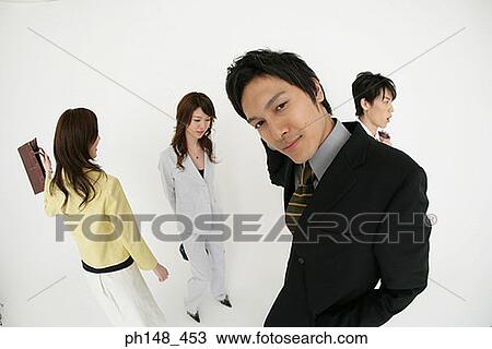 High angle view of two businessmen and two businesswomen View Large Photo Image Stock Image - High angle view of two businessmen and two businesswomen. Fotosearch