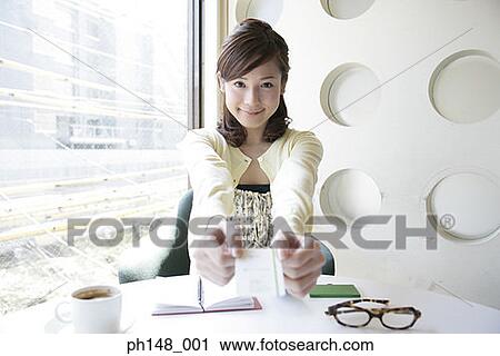 Portrait of a businesswoman showing her ID Card View Large Photo Image Stock Image - Portrait of a businesswoman showing her ID Card. Fotosearch