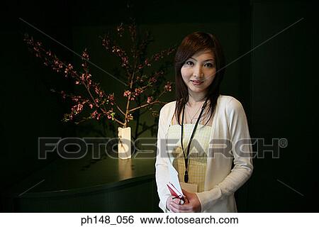 Portrait of a businesswoman smiling View Large Photo Image Stock Photograph - Portrait of a businesswoman smiling. Fotosearch
