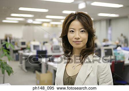 Portrait of a businesswoman smiling View Large Photo Image Stock Photography - Portrait of a businesswoman smiling. Fotosearch