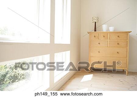 Stock Photography - Cabinet in the corner of a room. Fotosearch
