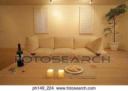 Candles and crackers with wine glasses on the table View Large Photo Image Picture - Candles and crackers with wine glasses on the table. Fotosearch