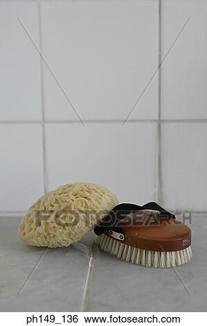 Close-up of a bath sponge with a brush View Large Photo Image Stock Photograph - Close-up of a bath sponge with a brush. Fotosearch