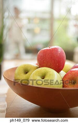 Close-up of a bowl of apples View Large Photo Image Stock Photo - Close-up of a bowl of apples. Fotosearch
