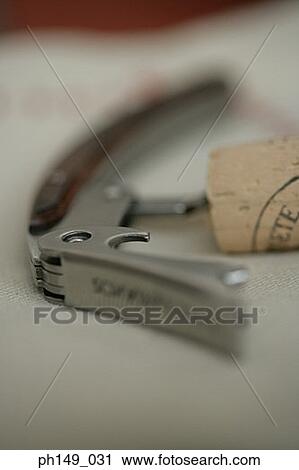 Close-up of a cork with a corkscrew View Large Photo Image Stock Image - Close-up of a cork with a corkscrew. Fotosearch
