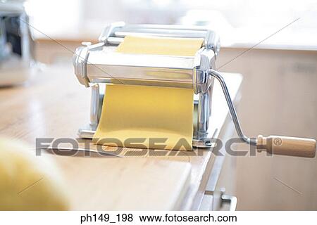 Close-up of a pasta maker View Large Photo Image Stock Photo - Close-up of a pasta maker. Fotosearch