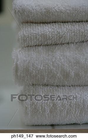 Stock Photo - Close-up of a stack of folded towels. Fotosearch
