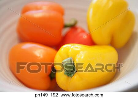 Stock Image - Close-up of bell peppers in a bowl. Fotosearch