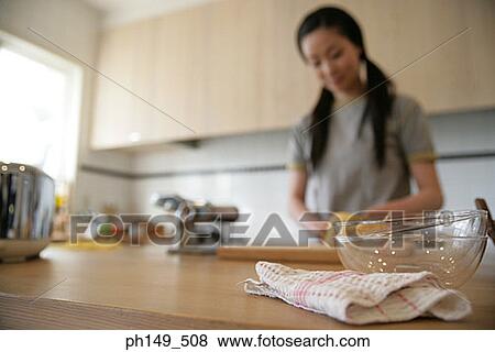 Close-up of bowls and a napkin on a kitchen island View Large Photo Image Stock Photo - Close-up of bowls and a napkin on a kitchen island. Fotosearch
