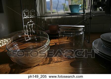Close-up of bowls and plates in the kitchen View Large Photo Image Stock Photography - Close-up of bowls and plates in the kitchen. Fotosearch