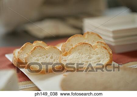 Close-up of bread slices on a tray View Large Photo Image Stock Photo - Close-up of bread slices on a tray. Fotosearch