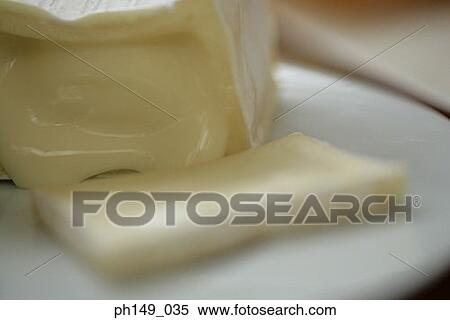 Close-up of butter in a plate View Large Photo Image Stock Photography - Close-up of butter in a plate. Fotosearch