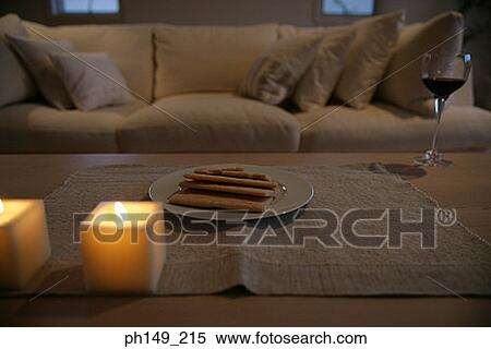 Close-up of crackers and candles with a glass of red wine on the table View Large Photo Image Stock Photography - Close-up of crackers and candles with a glass of red wine on the table. Fotosearch