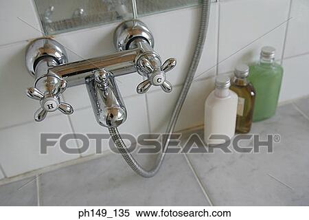 Close-up of faucets View Large Photo Image Stock Photography - Close-up of faucets. Fotosearch