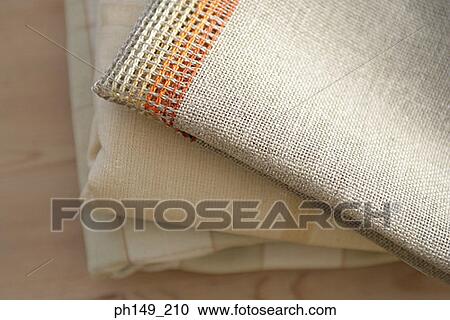 Close-up of folded fabrics View Large Photo Image Stock Image - Close-up of folded fabrics. Fotosearch