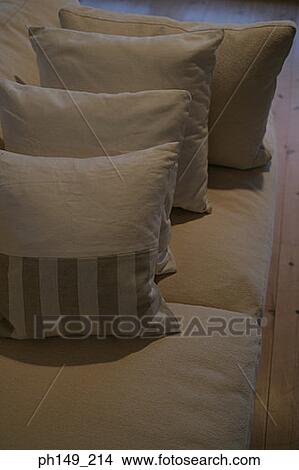 Close-up of four cushions on a couch View Large Photo Image Picture - Close-up of four cushions on a couch. Fotosearch